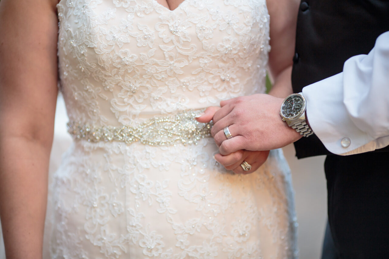 Wedding rings on the bride and groom